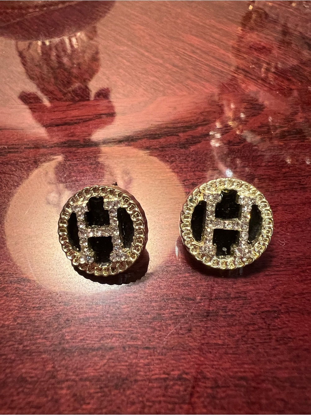 Round Gold-Tone H Stud Earrings with Black Enamel and Clear Crystal Accents